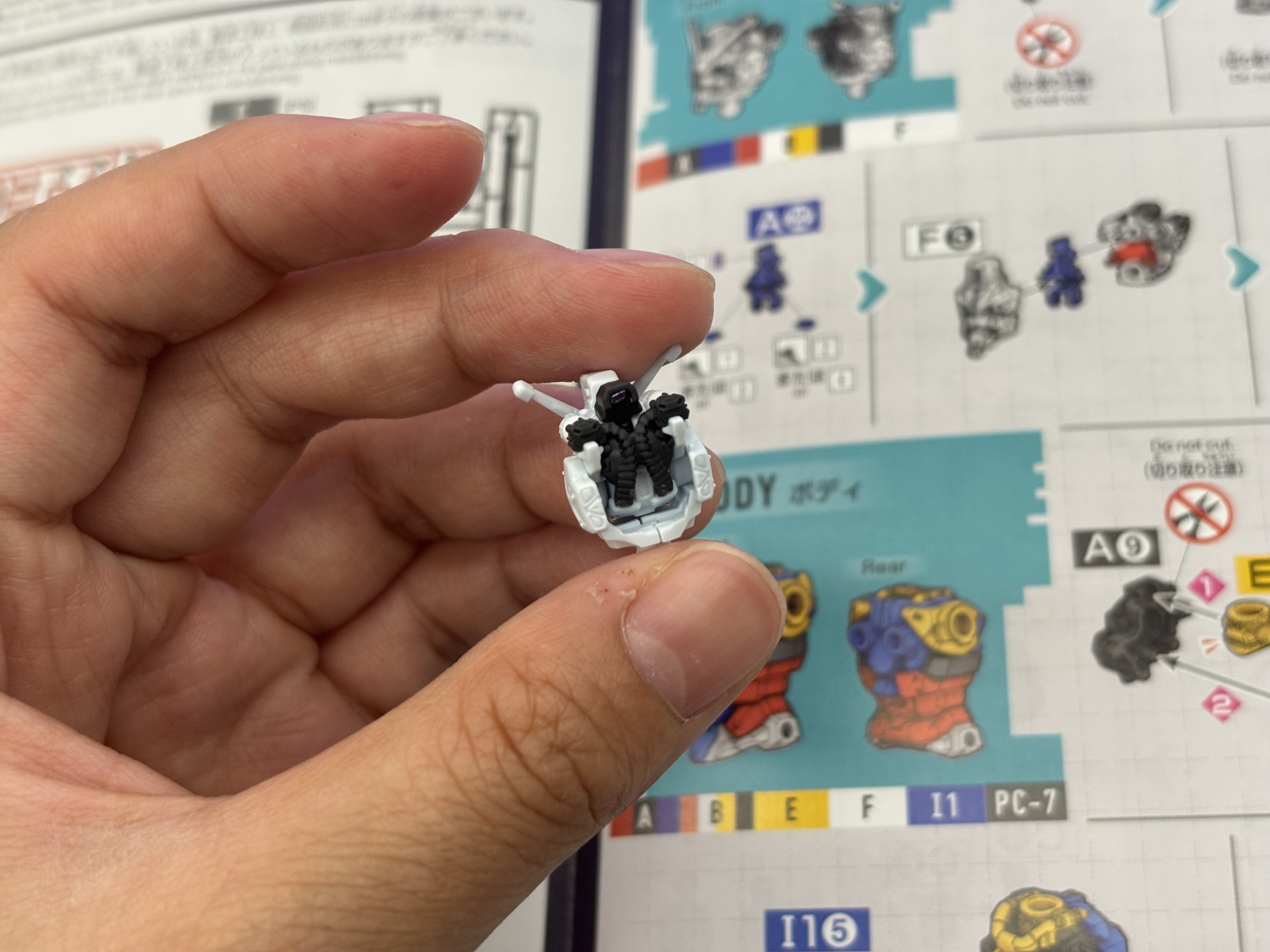 Back view of assembled Wing Gundam head subassembly.